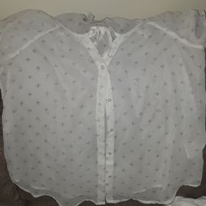 White blouse with blue pattern